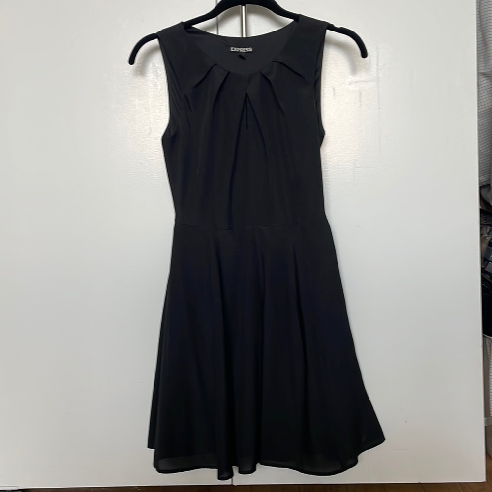 Express black dress. Pleated by the neck. Hidden side zipper. Size 2.